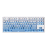 ATK A87 wireless gaming keyboard, 80% TKL layout, translucent blue gradient keycaps with ARGB lighting.